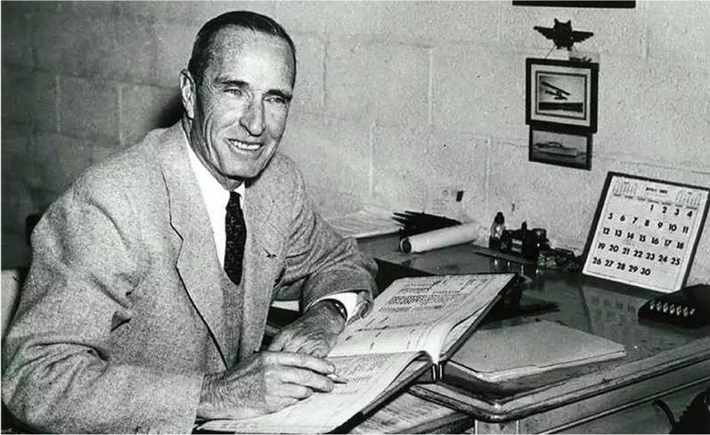 1961 - Photograph of John H. 'Jack' Tweed working as a airport manager at Tweed New Haven Airport